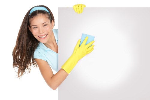 Team member reviewing a safe cleaning checklist
